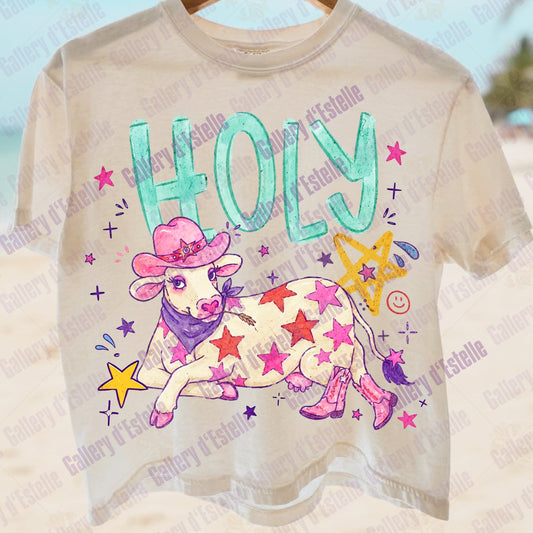 Funny t-shirt with a cowgirl-themed design featuring a cow in a pink hat and boots, surrounded by stars and the word 'HOLLY'.