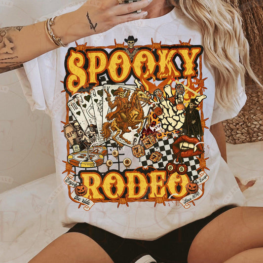 Person wearing a white t-shirt with 'Spooky Rodeo' graphic design.