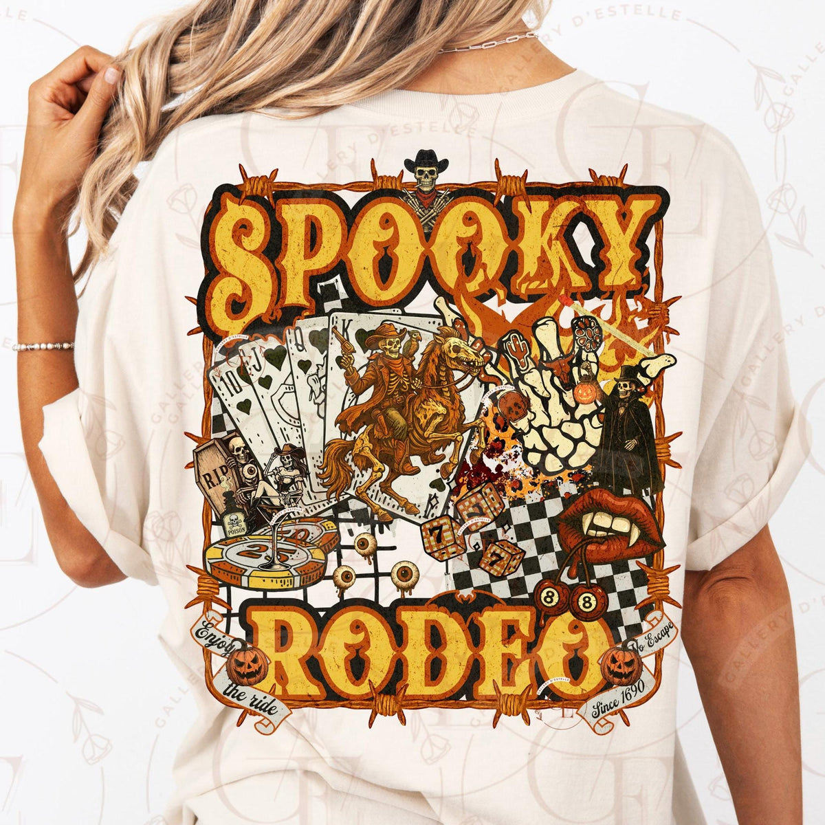 Person wearing a white t-shirt with a 'Spooky Rodeo' graphic design on the back.