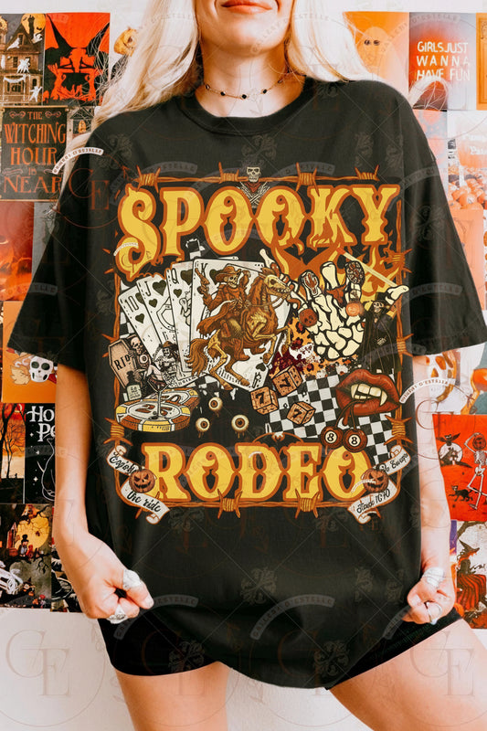 Person wearing a black t-shirt with 'Spooky Rodeo' graphic design in front of a colorful background.