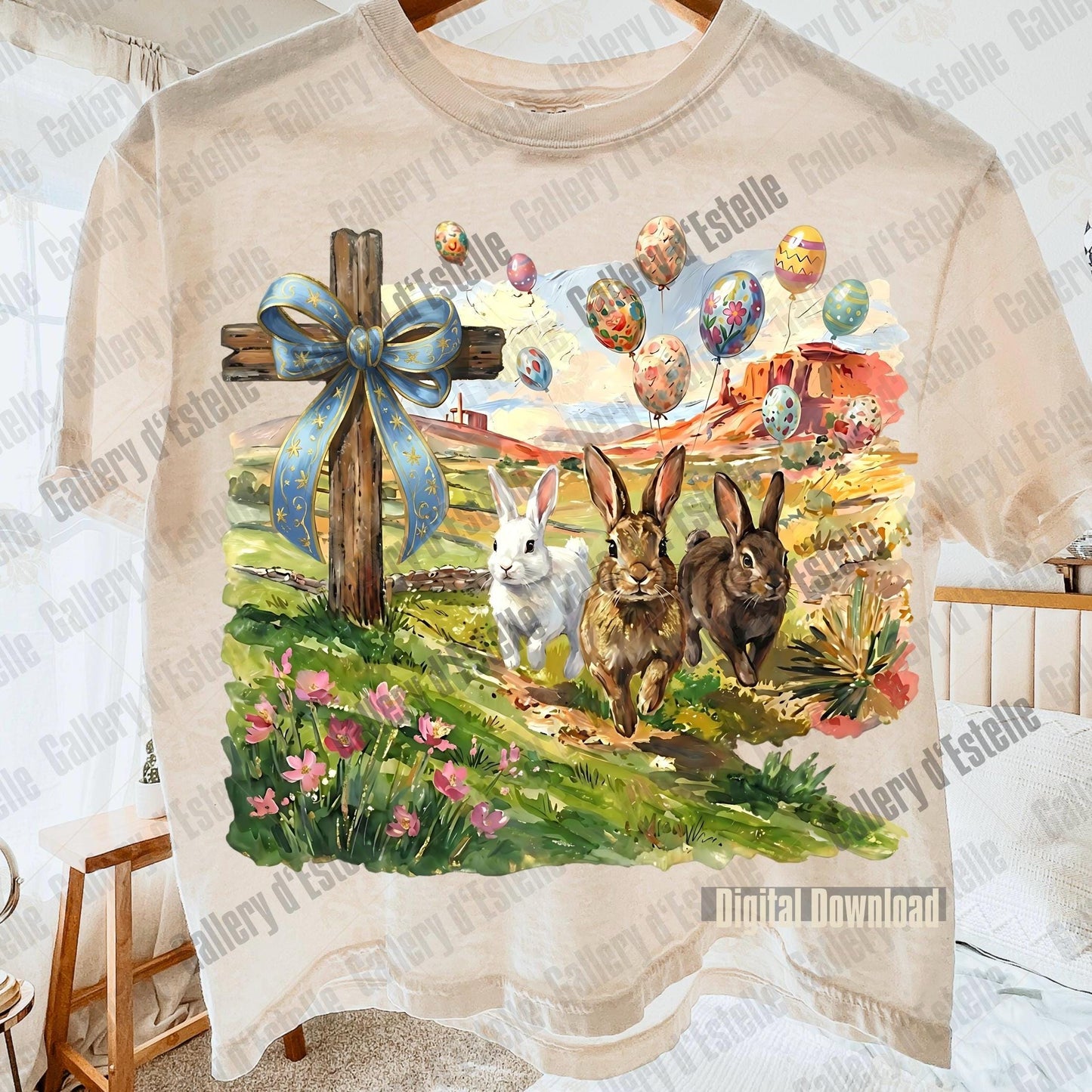 T-shirt with Easter design featuring bunnies, a cross, and colorful eggs.