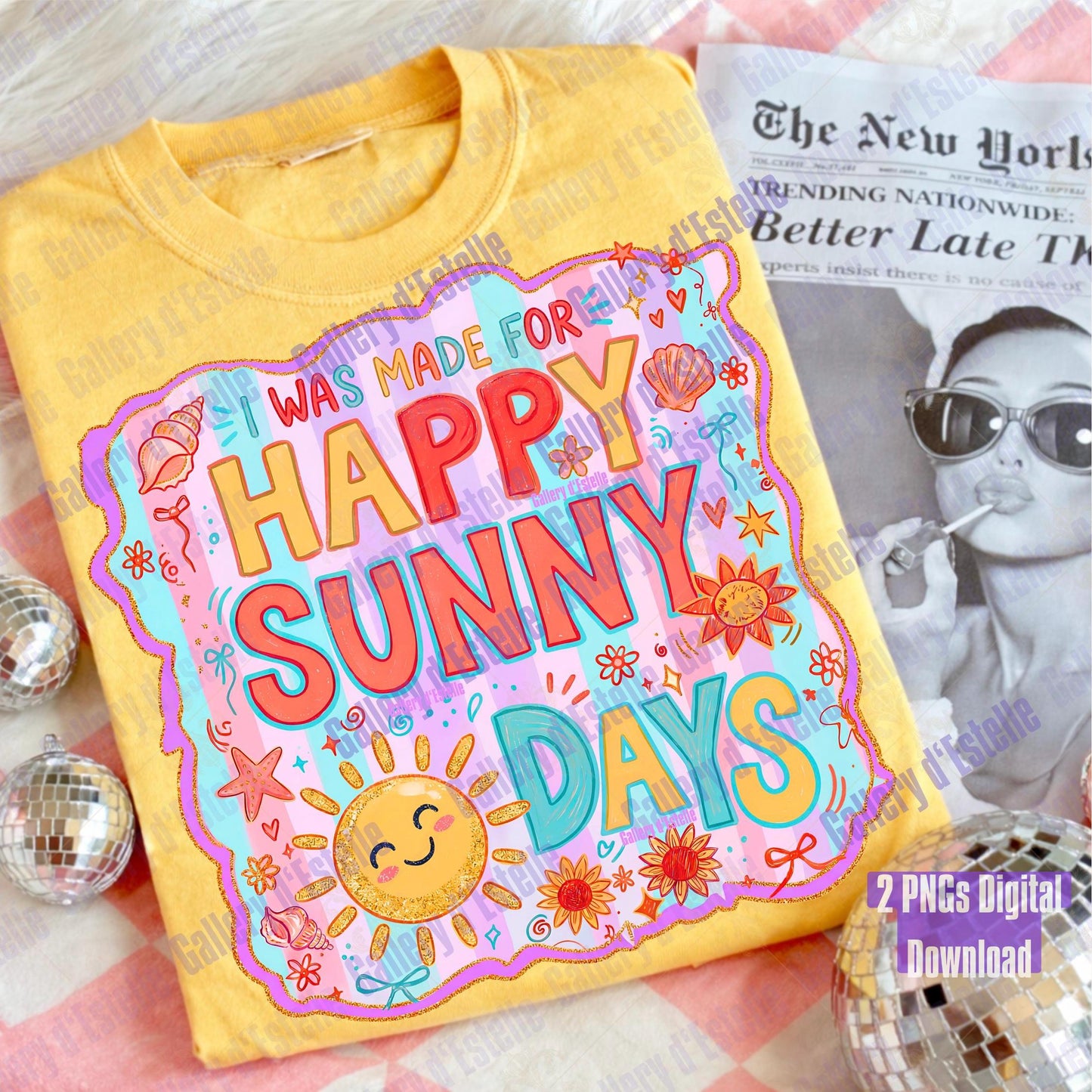 Yellow t-shirt with 'Happy Sunny Days' design on a surface with a magazine and disco ball.