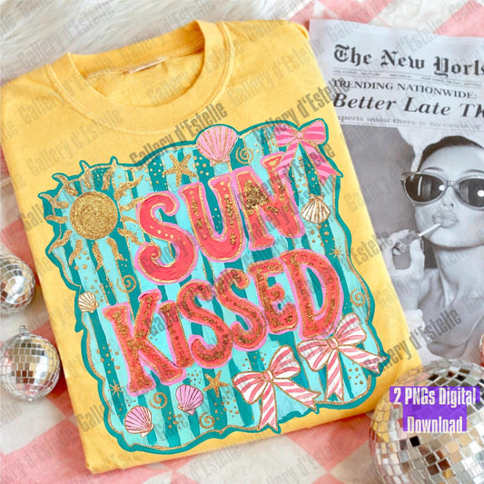 Yellow t-shirt with 'Sun Kissed' design on a surface with a magazine underneath