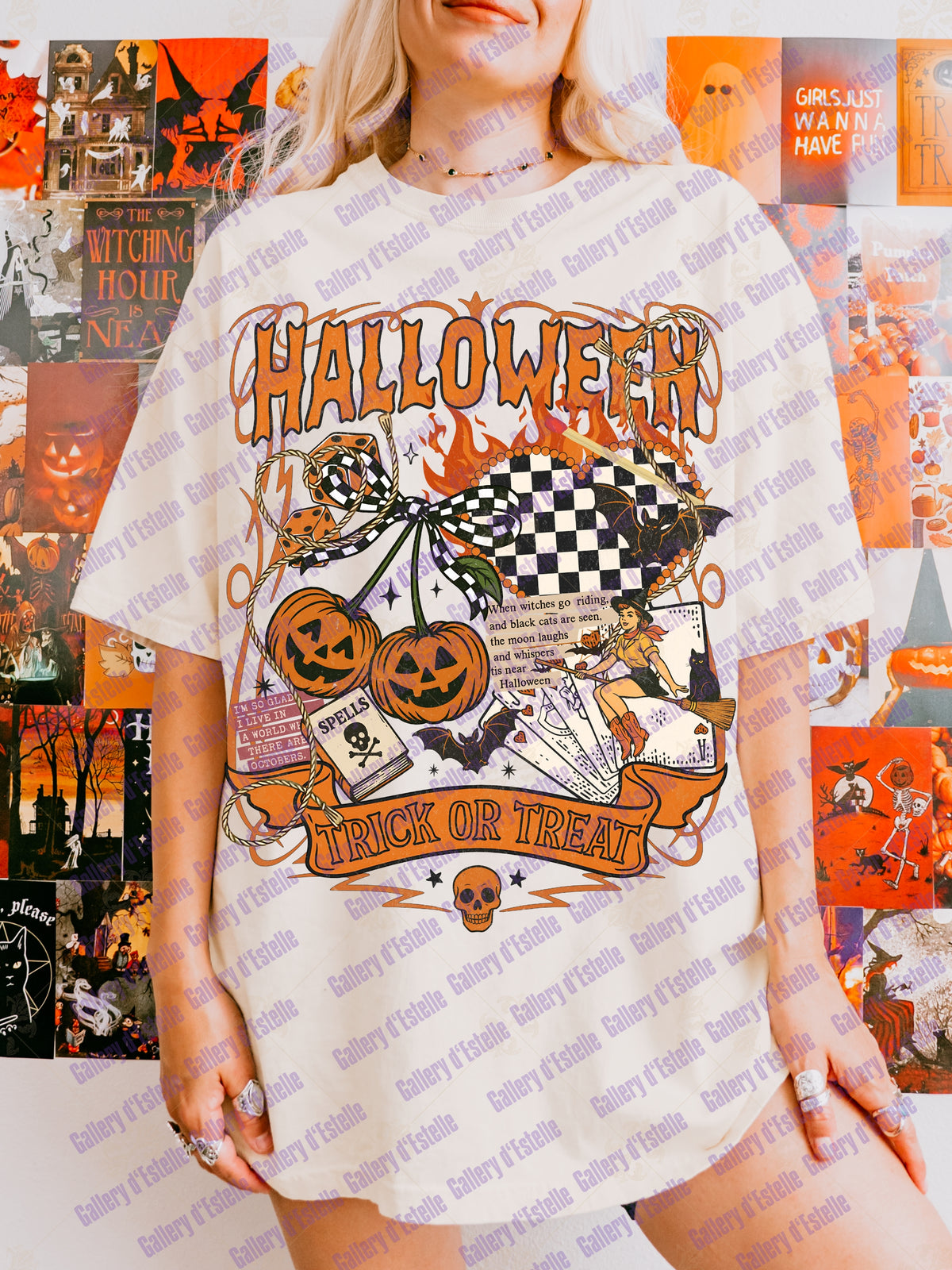 A woman wearing an oversized white - colored graphic t-shirt with a Halloween design. The graphic features orange jack-o'-lanterns, a black and white checkered flag, playing cards, a witch, and the words 'HALLOWEEN' and 'TRICK OR TREAT'.