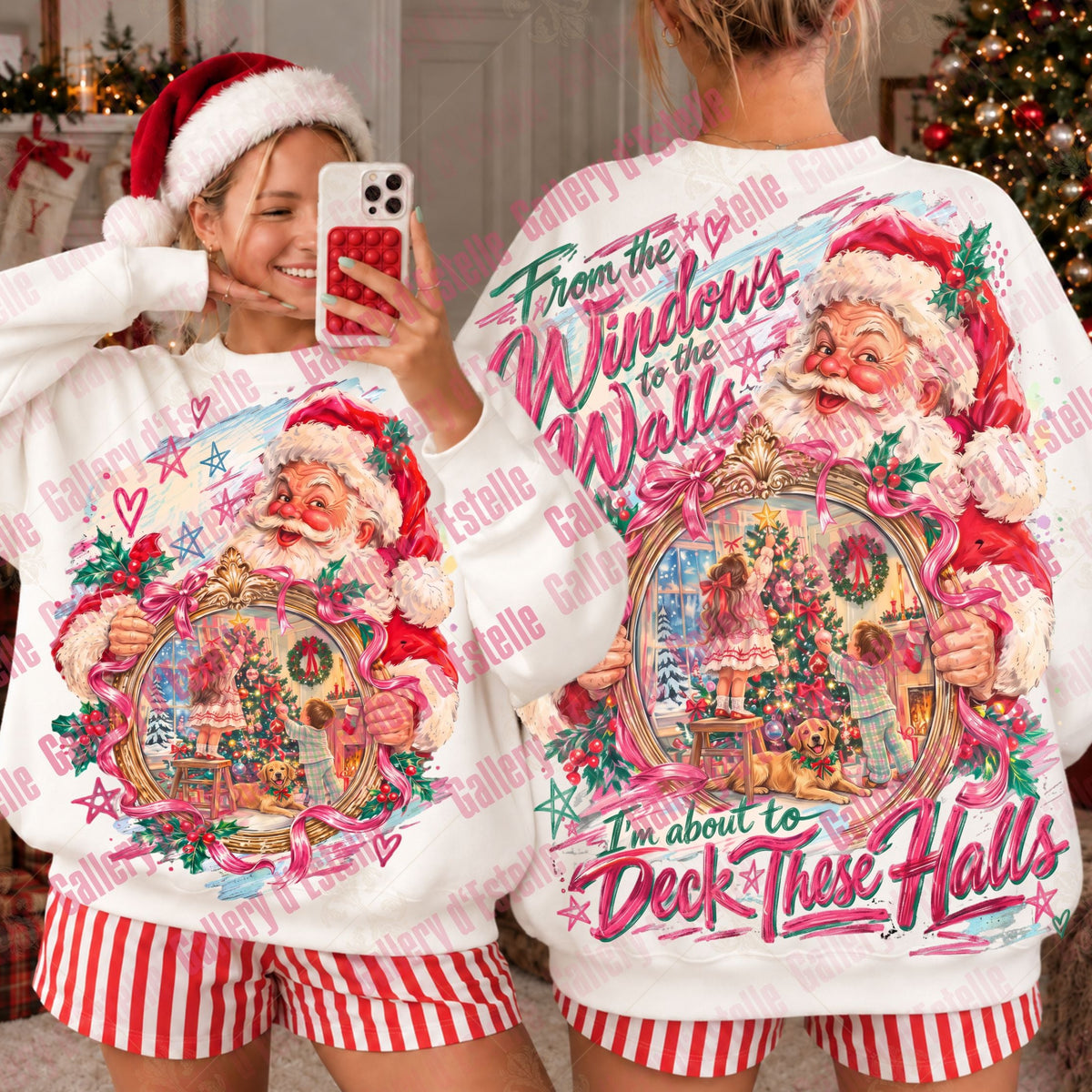A person modeling a white Christmas-themed sweatshirt shown from both front and back, with Santa graphics and pink script text. A real indoor holiday setting with a decorated tree is visible in the background.