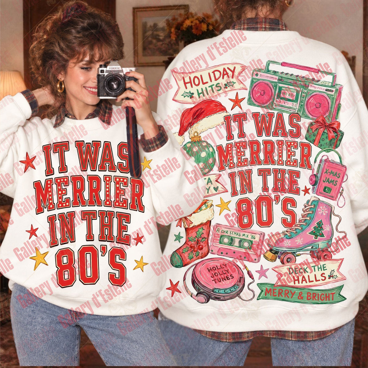 Two people modeling a white sweatshirt with a colorful retro 1980s holiday graphic. One person shows the front with the text 'IT WAS MERRIER IN THE 80'S' in red, and the other shows the back with additional festive illustrations including boomboxes, ornaments, and a pink slipper.