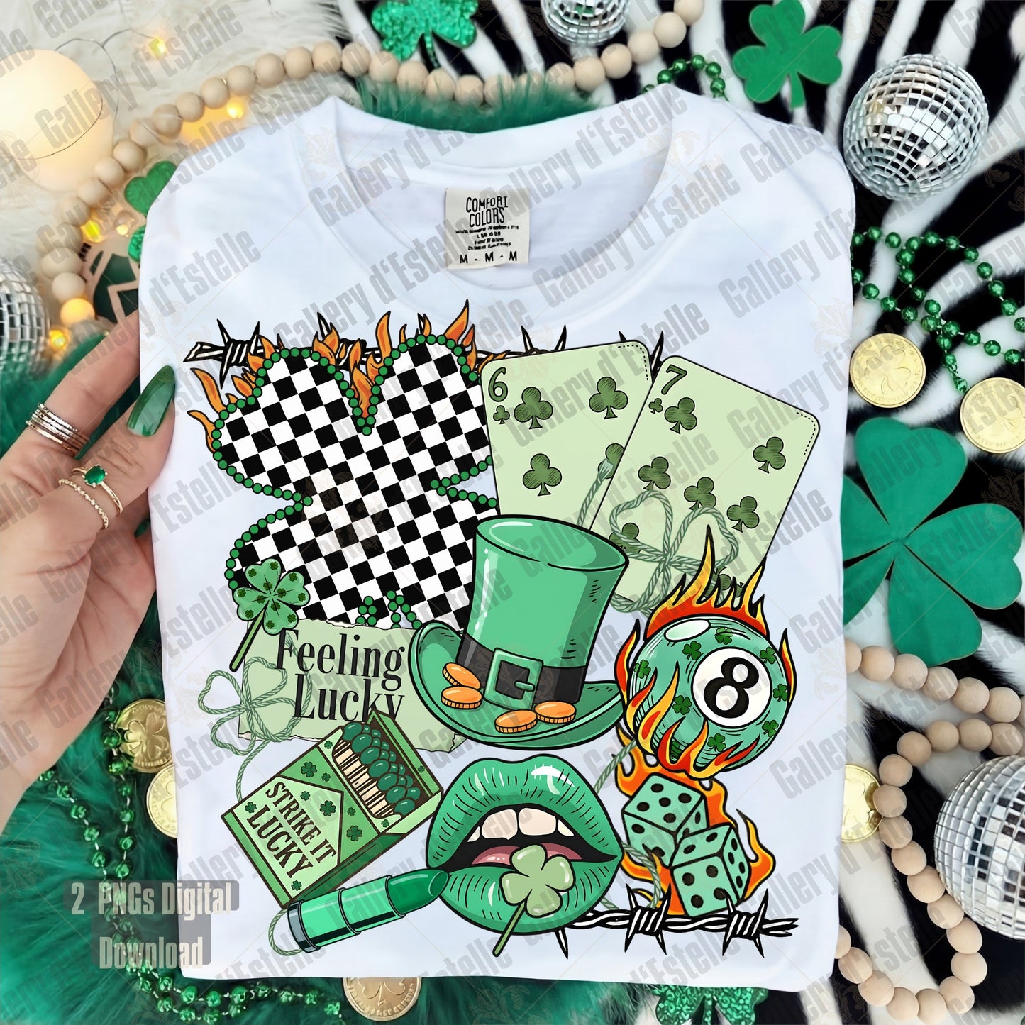 White Tshirt with St. Patrick's Day-themed designs including a four-leaf clover, green hat, and flames.