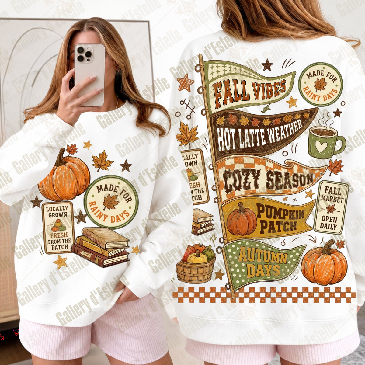 A white long-sleeve sweatshirt with a colorful autumn-themed graphic print, shown in both front and back views. The design features pumpkins, fall leaves, books, a coffee mug, and text like 'Fall Vibes', 'Cozy Season', and 'Autumn Days'.