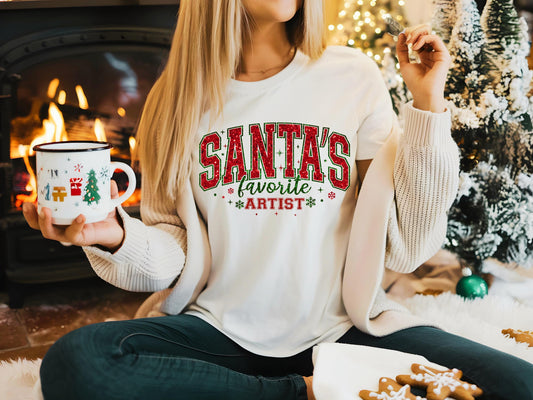 Santa's Favorite Artist PNG, Glitter Retro Christmas Graphic, Festive Santa Claus Shirt Design