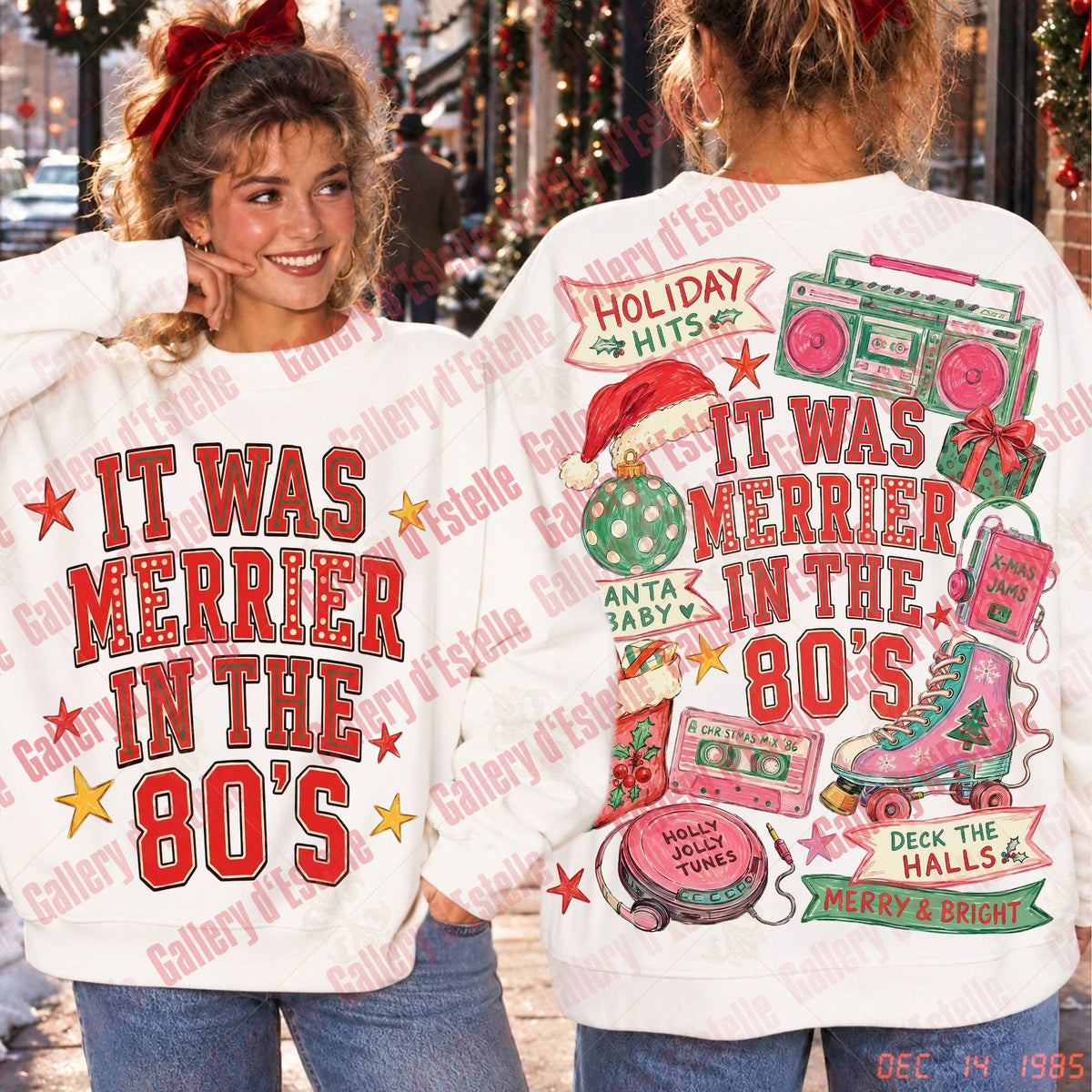 Two women modeling a white sweatshirt with a colorful Christmas 1980s graphic. The front shows the text 'IT WAS MERRIER IN THE 80's' in red with white outline and red stars.