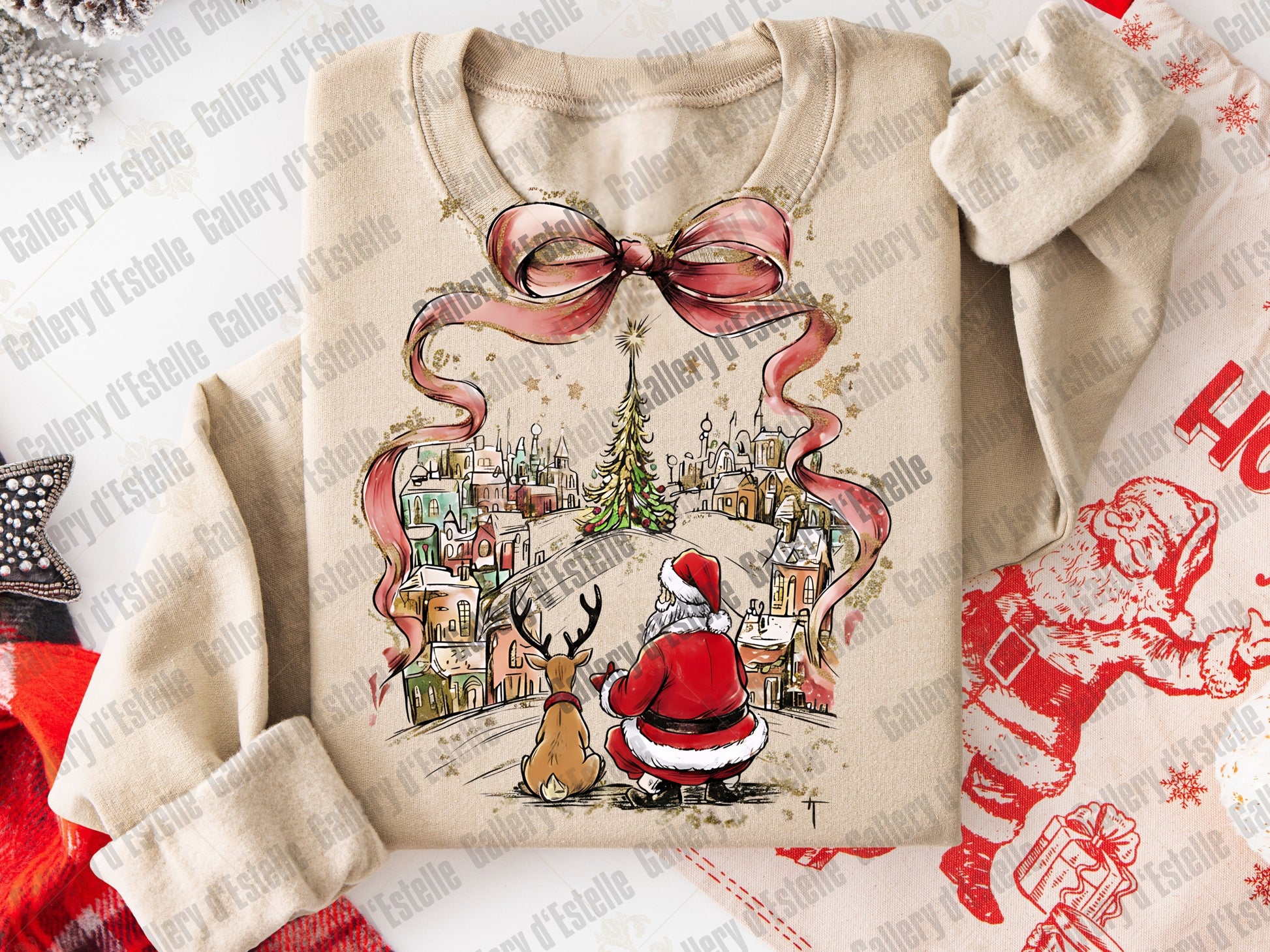 Beige sweatshirt with Christmas-themed design featuring Santa Claus and reindeer on a white background.