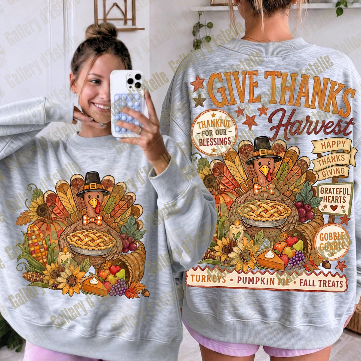 A woman modeling a light gray sweatshirt with a large Thanksgiving harvest graphic, shown in both front and back views. The sweatshirt features a turkey, pie, pumpkins, corn, and autumn-themed text including 'GIVE THANKS Harvest' and 'THANKFUL FOR OUR BLESSINGS'.