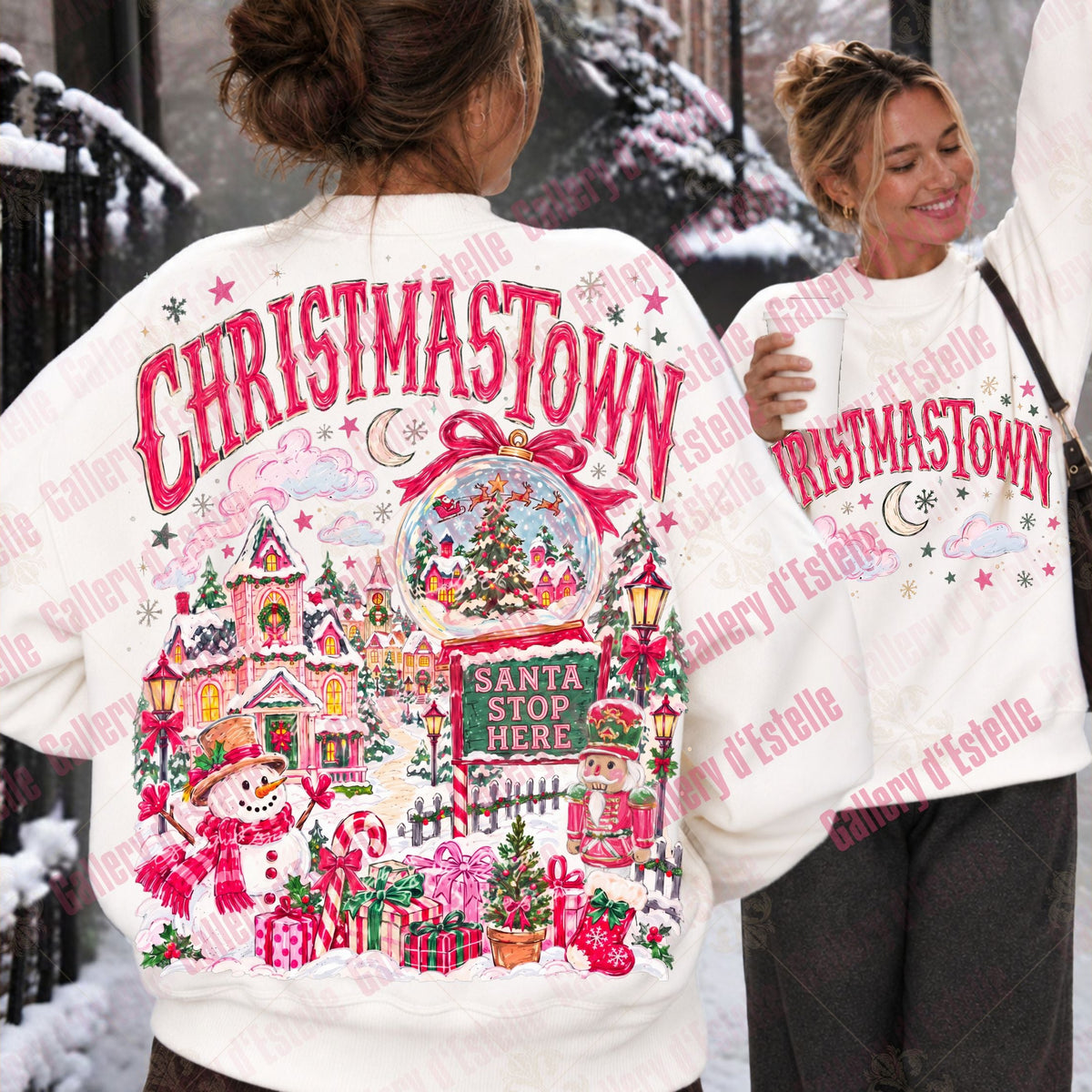 A woman wearing a white Christmas-themed sweatshirt, shown from the back with a mirror showing the front view. The sweatshirt features a large colorful graphic of a snowy Christmas scene with 'CHRISTMASTOWN' in red letters.