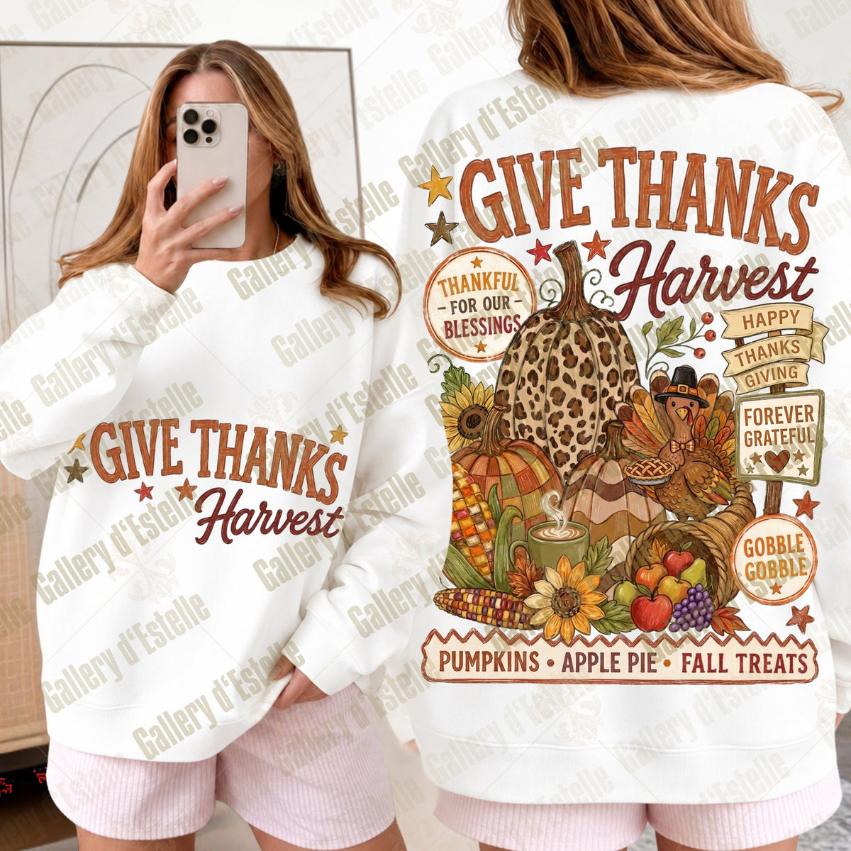 A white long-sleeve sweatshirt with a large autumn harvest graphic on the back, shown on a model from both front and back. The graphic features pumpkins, an apple pie, fall treats, and the text 'GIVE THANKS Harvest'.