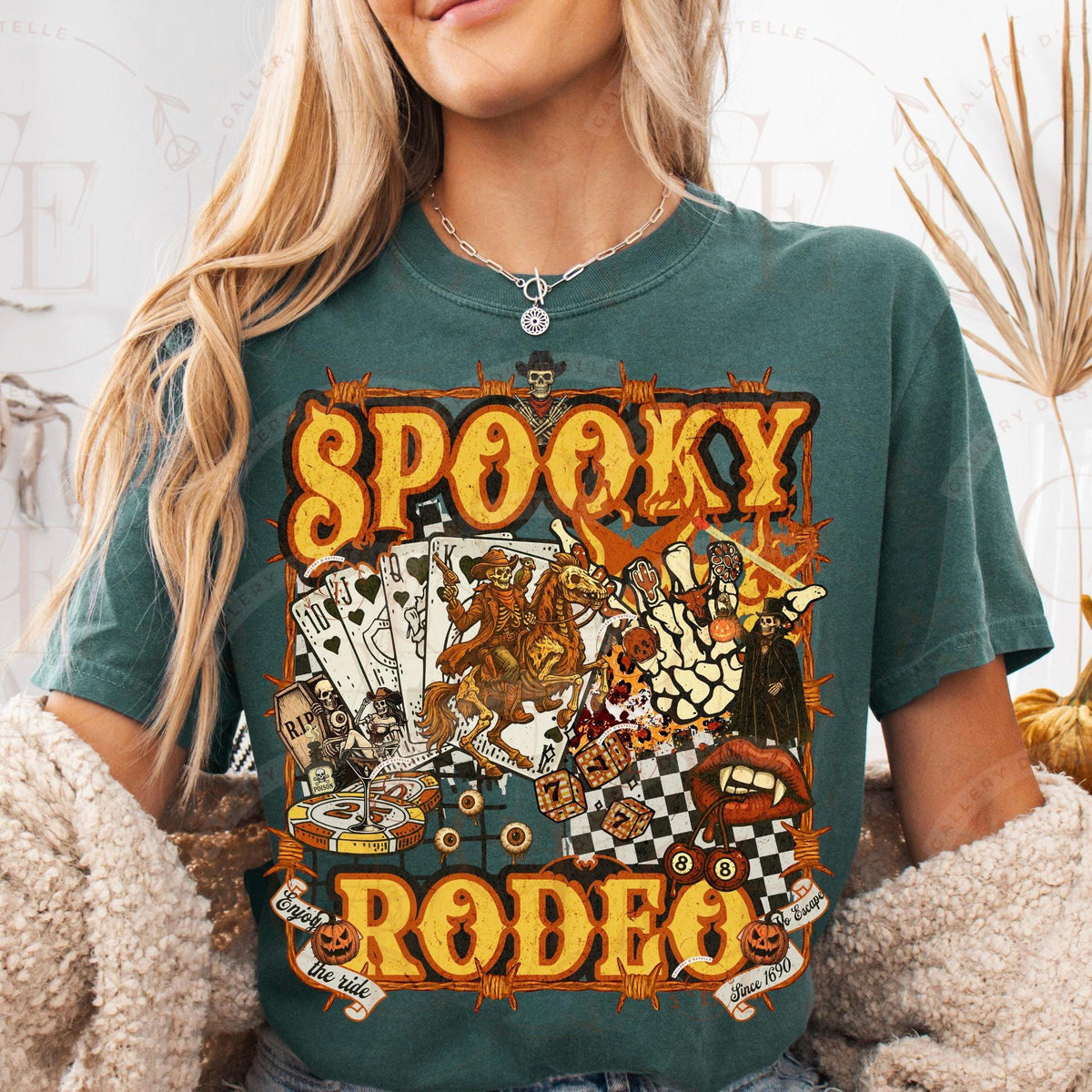 Person wearing a green t-shirt with 'Spooky Rodeo' graphic design.