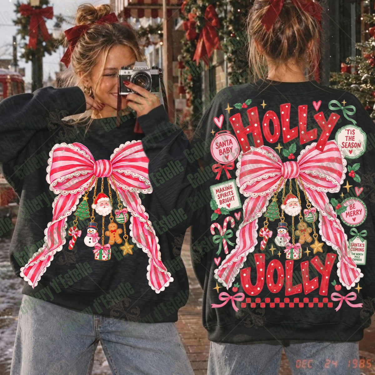 Two women shown from the back wearing matching black Christmas sweatshirts with large pink-and-white striped bow graphics and holiday decorations. The right sweatshirt also features the words “HOLLY JOLLY” in red and green festive lettering with candy cane and Santa motifs.