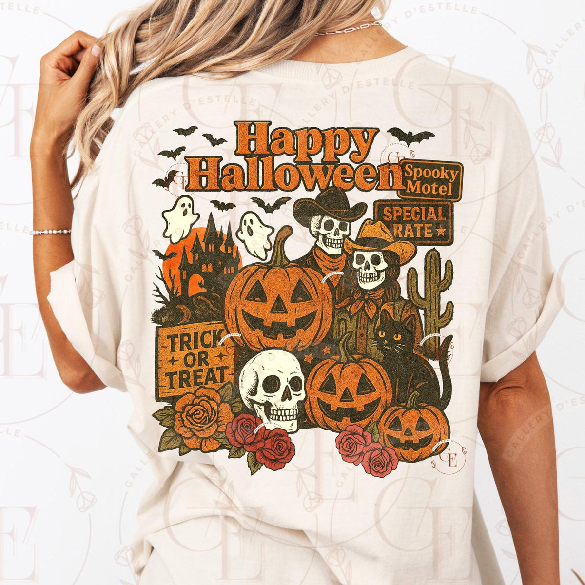 White t-shirt with Halloween-themed design featuring pumpkins, ghosts, and skeletons on a white background.