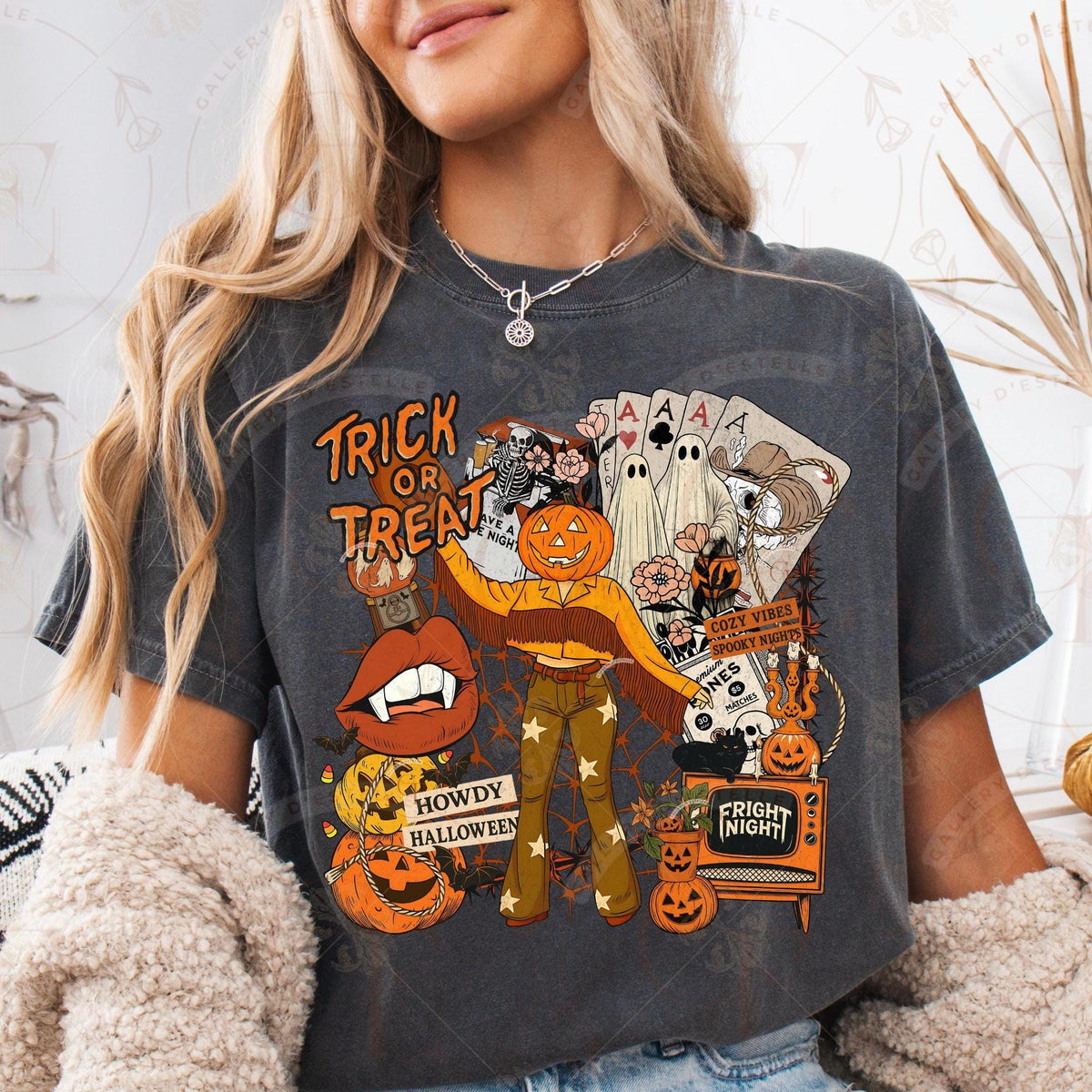 Person wearing a Halloween-themed t-shirt with graphics and text.
