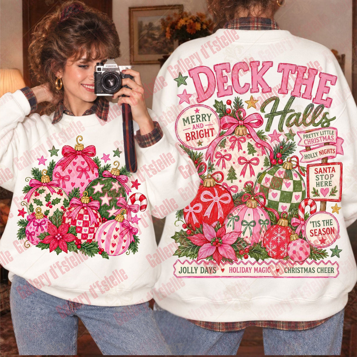 A person modeling a white Christmas-themed sweatshirt, showing both the front and back designs. The front features a large pink and red ornament graphic with green pine branches.