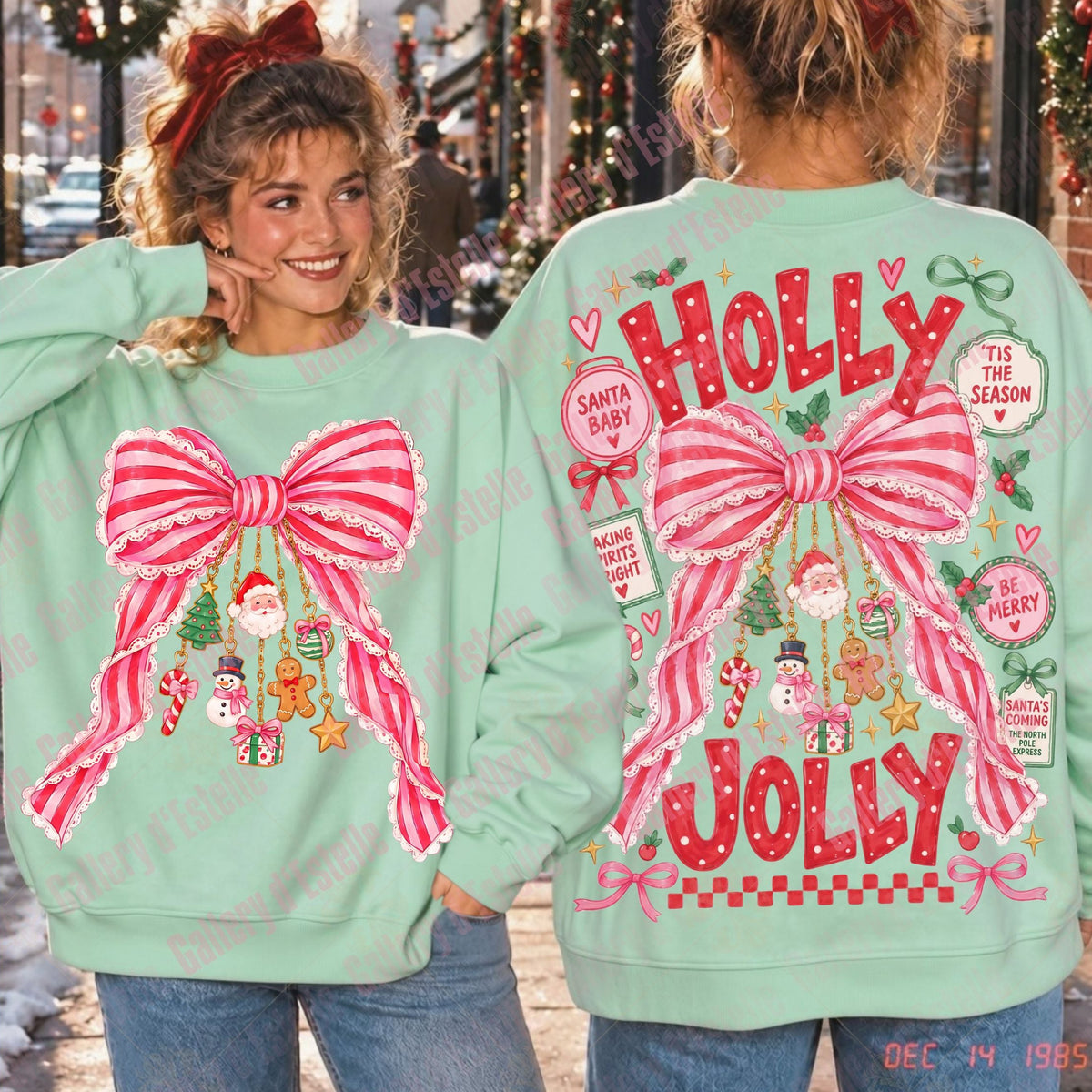 A mint green Christmas sweatshirt shown from both front and back on a model. The front features a large pink and white striped bow graphic with small holiday ornaments.