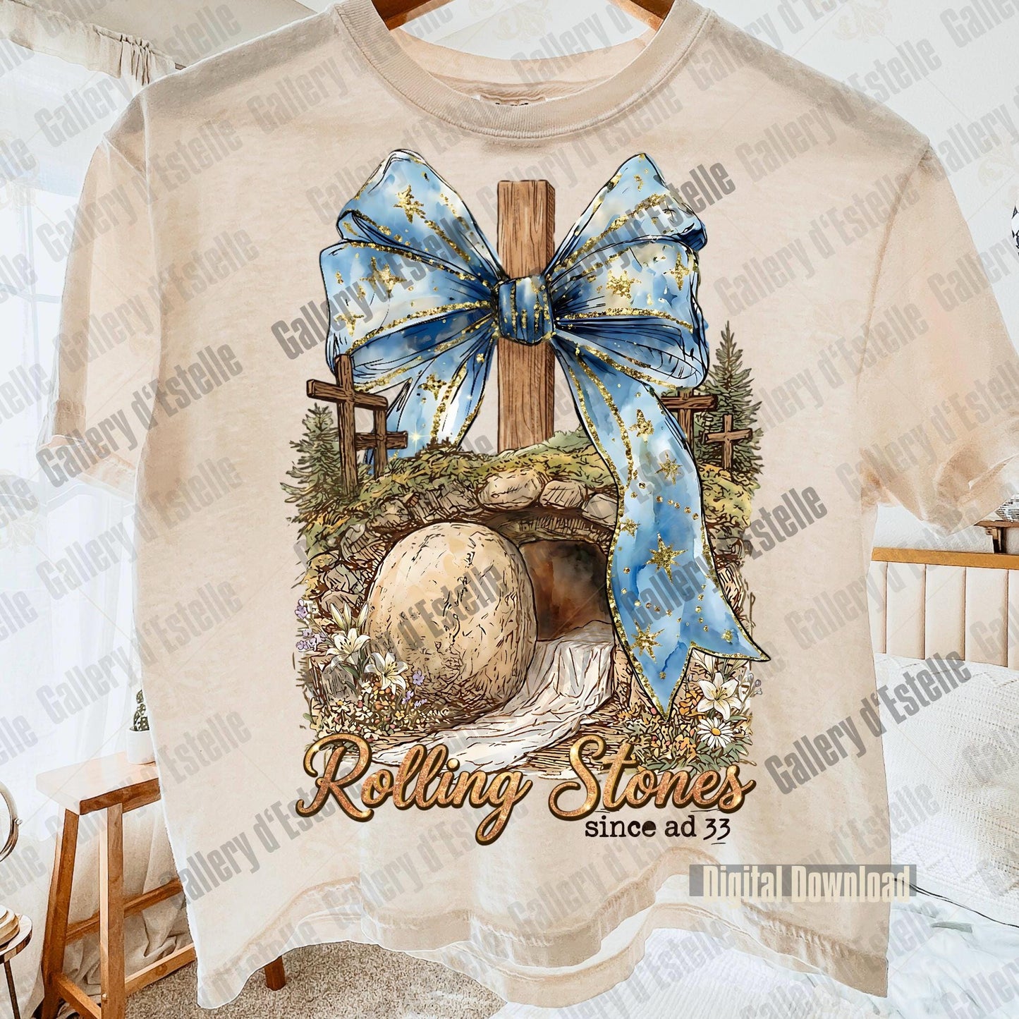 Beige t-shirt with a graphic design featuring a blue bow, stone archway, and text 'Rolling Stones since ad 33' on a white background.