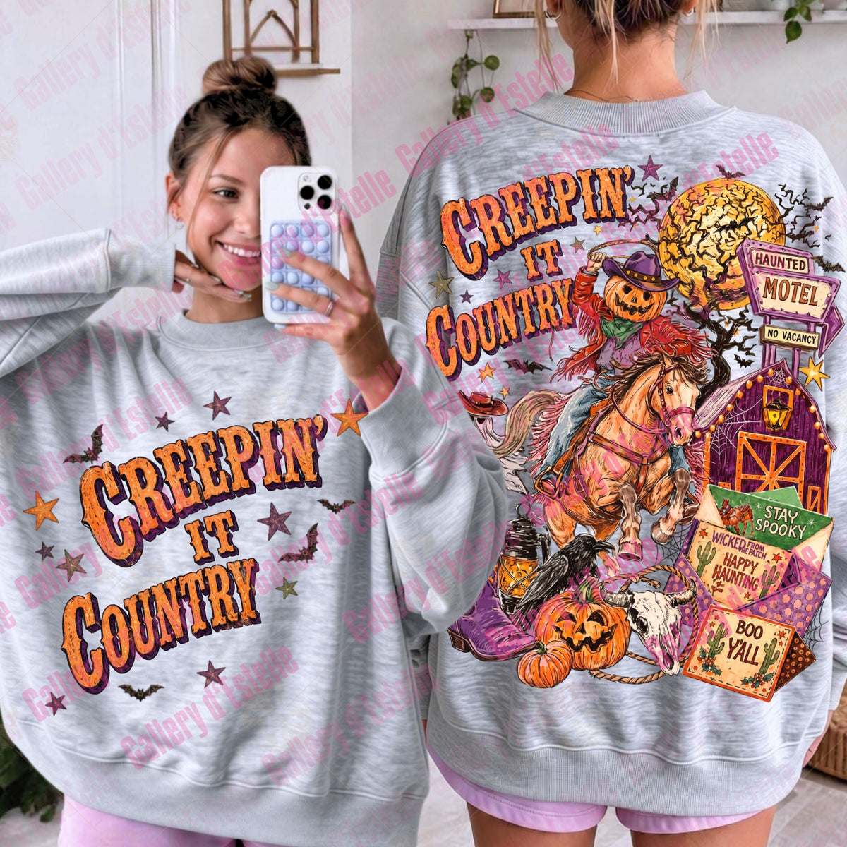 A light gray crewneck sweatshirt with a Halloween-themed graphic print, shown from both the front and back on a model. The front features the text 'CREEPIN' IT COUNTRY' in orange and yellow.