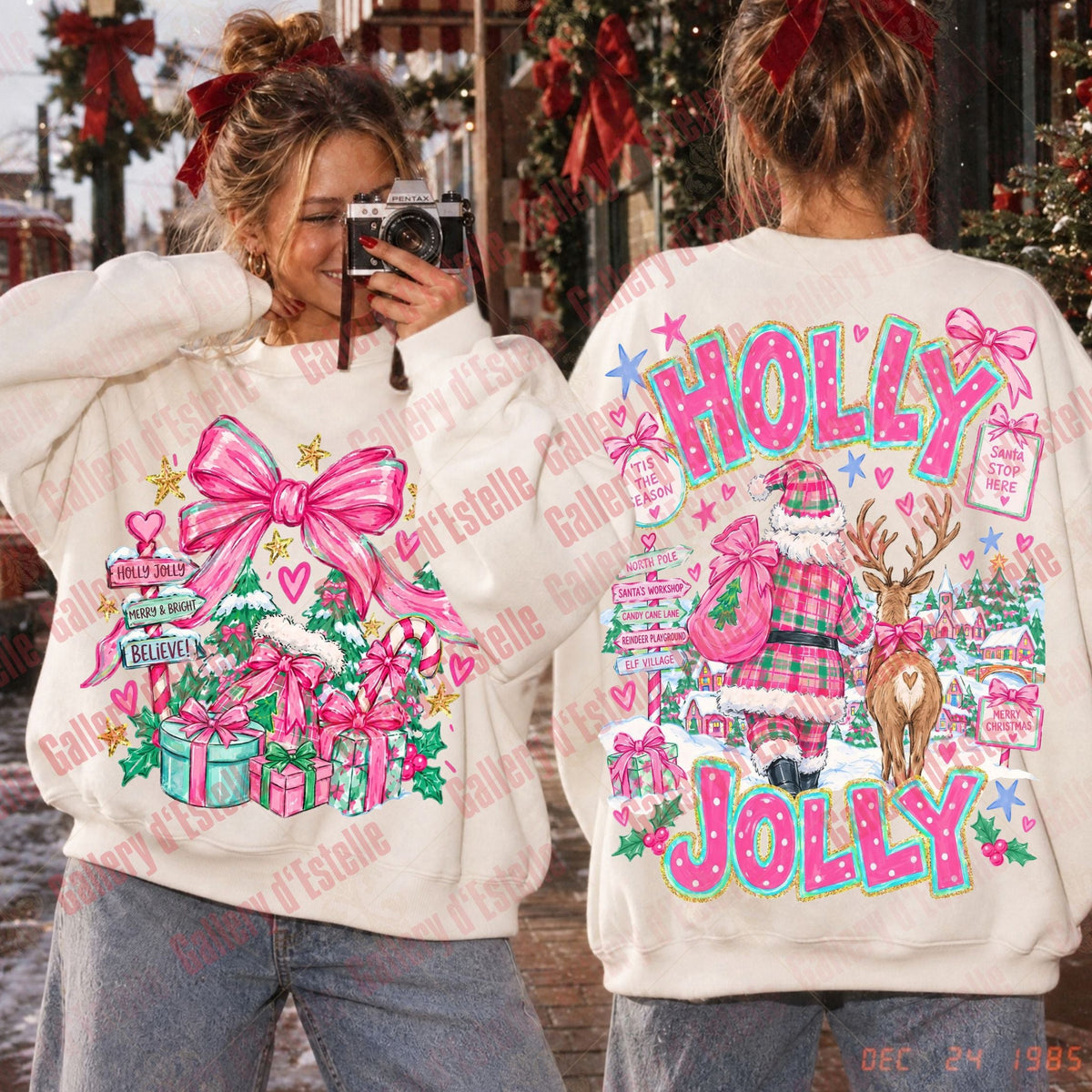 A person modeling a cream-colored Christmas sweatshirt, showing both the front and back views. The front features a pink bow and gift graphic, while the back displays 'HOLLY JOLLY' in colorful letters with a reindeer and holiday scene.