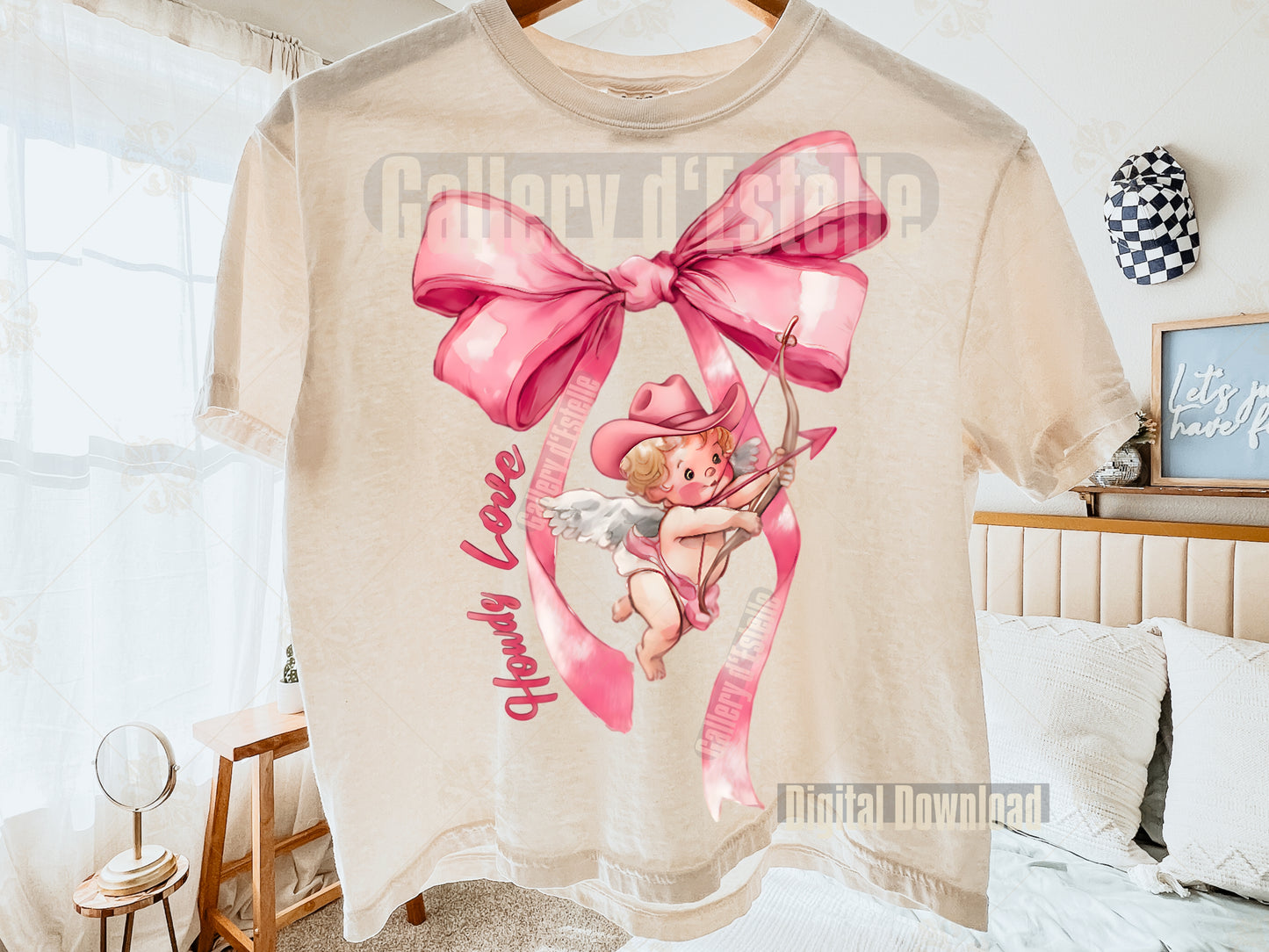 This adorable design brings together soft coquette pinks, a flowing satin bow, and the sweetest little cowboy cupid for a dreamy Western-Valentine moment
