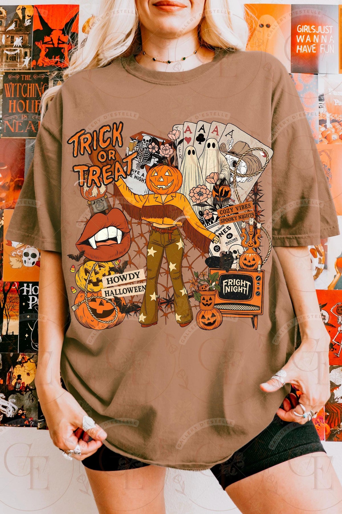 Person wearing a brown Halloween-themed t-shirt with graphics and text.