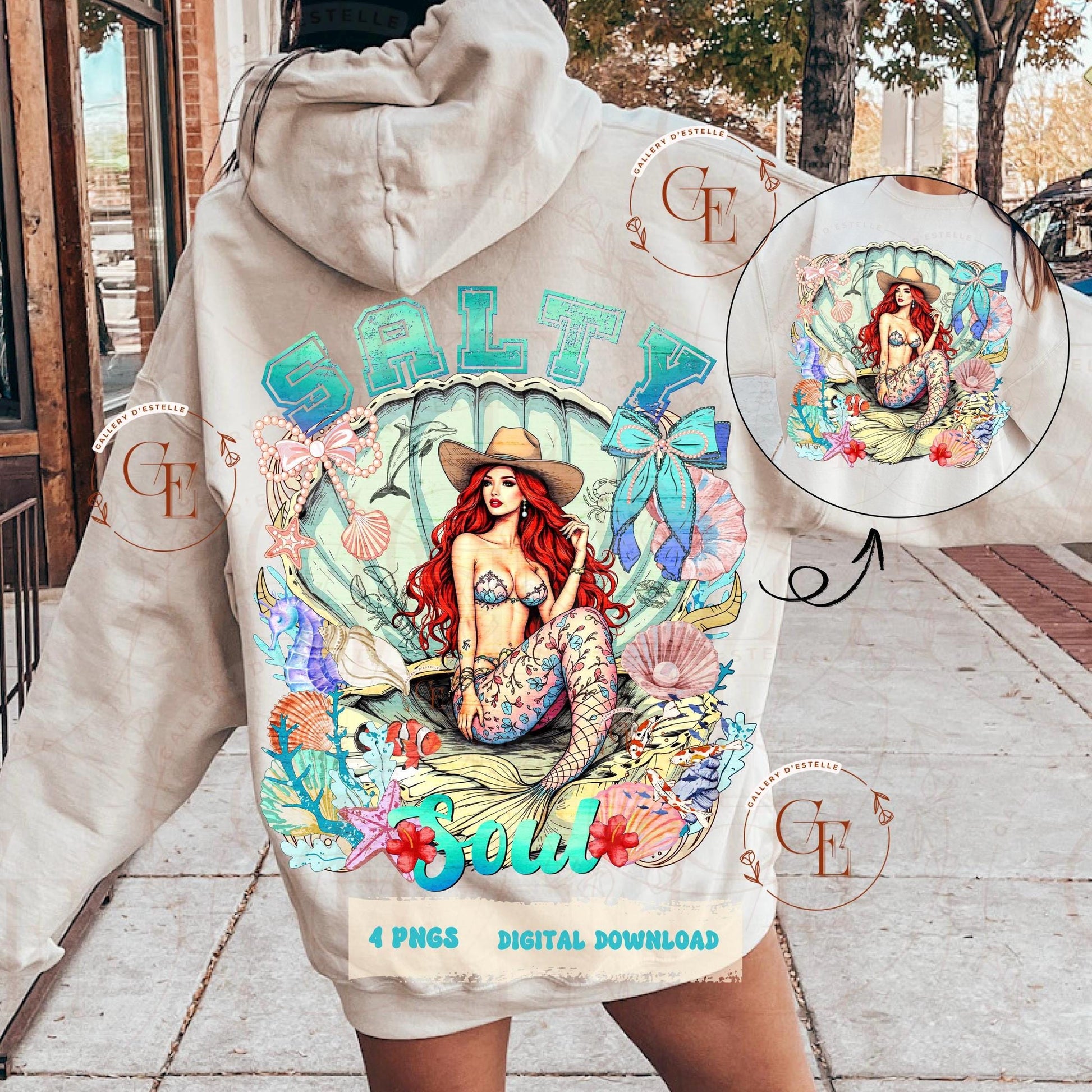 Hoodie with a mermaid design and 'SALTY Soul' text, displayed outdoors.