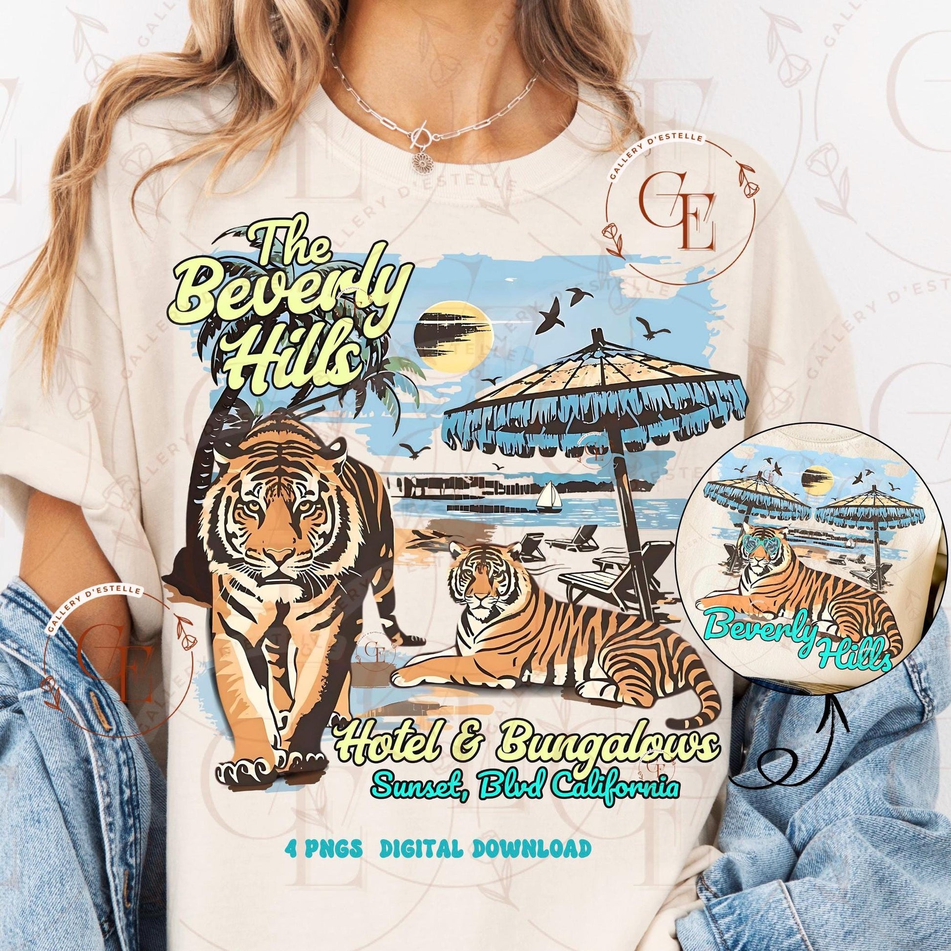 Beige t-shirt with tiger graphic and 'The Beverly Hills Hotel & Bungalows' text on a wooden surface.