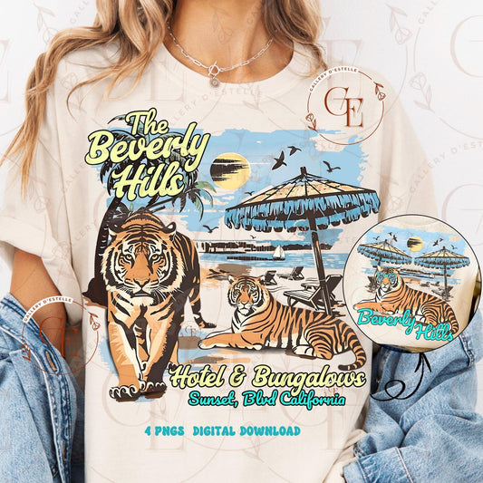 Beige t-shirt with tiger graphic and 'The Beverly Hills Hotel & Bungalows' text on a wooden surface.
